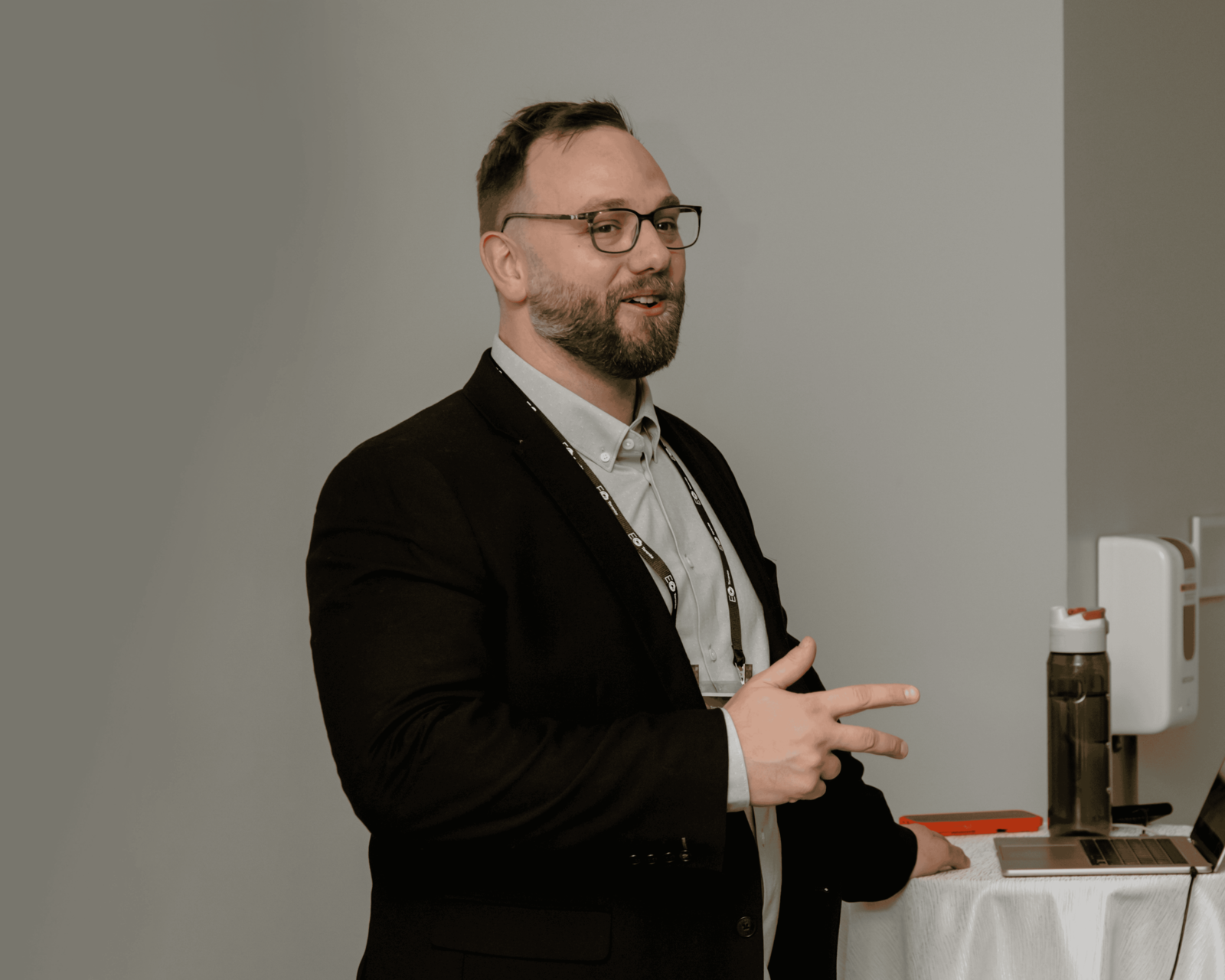 Phil Neil speaking on stage