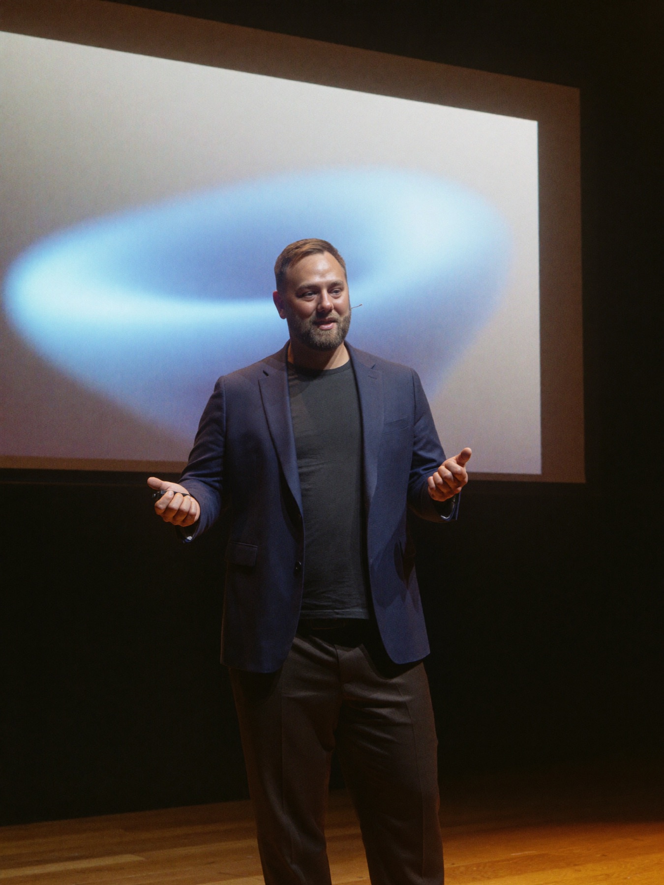Phil Neil giving a keynote on stage